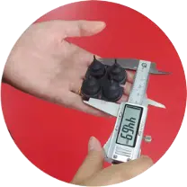 First article inspection: quality controller checking silicone sample dimensions