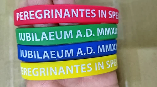 Comparison of silk print, embossed, debossed, and debossed with color-fill logo techniques on silicone wristbands